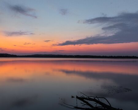 Sunset reflecting on lakeの写真素材