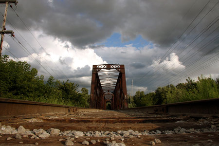 close-up of the tracks lead you into this rail bridge from another era of bridge building