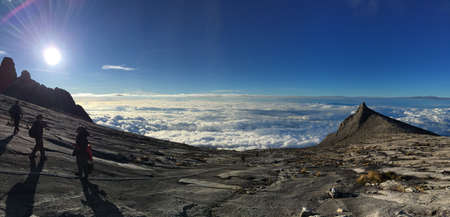 Up, and all the way down from the Peak of Mt. Kinabalu, with a sea of clouds.のeditorial素材