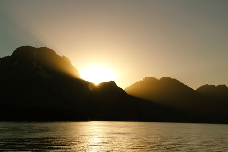 The sun peeks through one last time before settingの写真素材