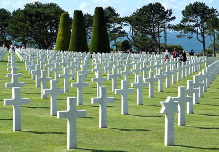 The cemetery is located on a cliff overlooking Omaha Beach (one of the landing beaches of the...