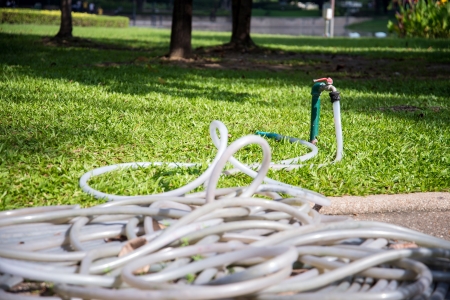 Faucets of lawn care system within the park.の写真素材