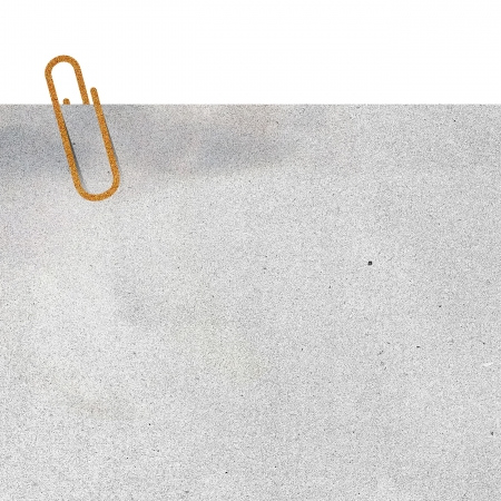 paper clip and paper on white backgroundの写真素材