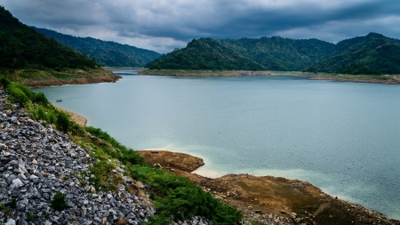 River and mountain backside of Khundanprakanchon dam, Nakhon Nayok, Thailandの写真素材