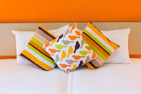 bed with pillowsの写真素材