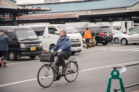 Tokyo, Japan - March 03, 2015: Famous Tsukiji fish market shops. Tsukiji is the biggest fish market in the world, with a vast varaiety of Fish and Sea foodのeditorial素材