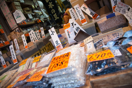 Tokyo, Japan - March 03, 2015: Famous Tsukiji fish market shops. Tsukiji is the biggest fish market in the world, with a vast varaiety of Fish and Sea foodのeditorial素材
