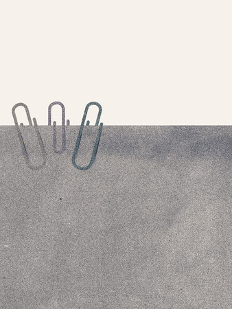 Paper clip and recycle paper on white backgroundの写真素材