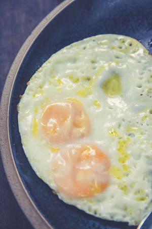 fried egg (Vintage filter effect used)の写真素材