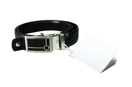 Black leather belt isolated on white background の写真素材