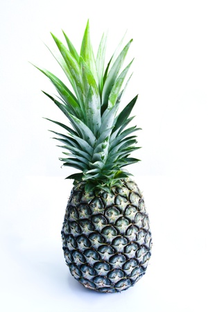 A fresh pineapple isolated on whiteの写真素材