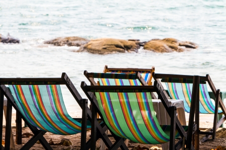 Green beach chairs on the beach in Pattayaの写真素材