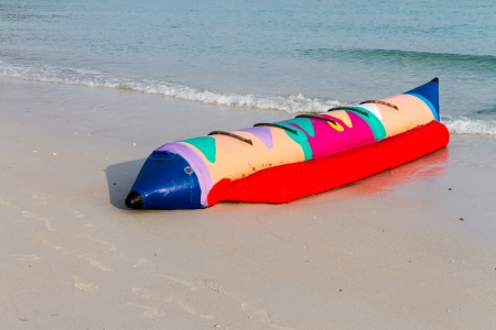 banana boat lays on a beachの写真素材