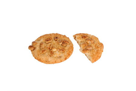 butter cookies with peanuts on a white backgroundの写真素材