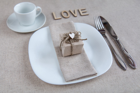 decorated table for Valentine's with gifts and heartsの写真素材