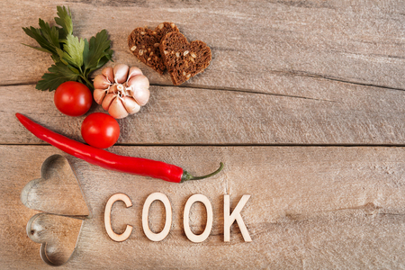 Ingredients for cooking on an old wooden table. Food background concept with copyspaceの写真素材