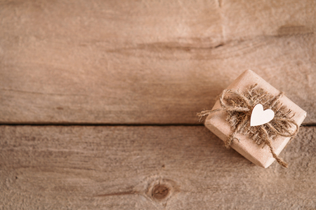 gift your beloved with a heart on a wooden tableの写真素材