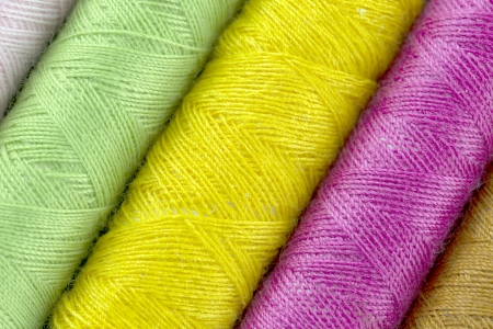 Sewing threads multicolored background closeupの写真素材