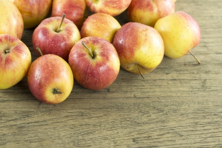 Apple of natural light on wood backgroundの写真素材