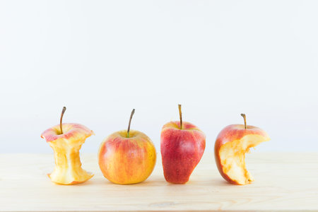 Red ripe apple on white background