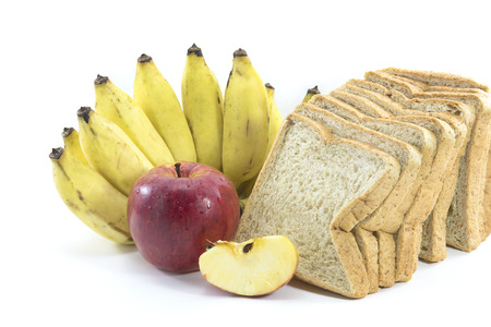 Mixed Fruits include Red ripe apple  banana oranges and Bread wheat
on white backgroundの写真素材