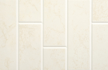 Decorative yellow tile of brick pattern wall texture in vertical viewの写真素材