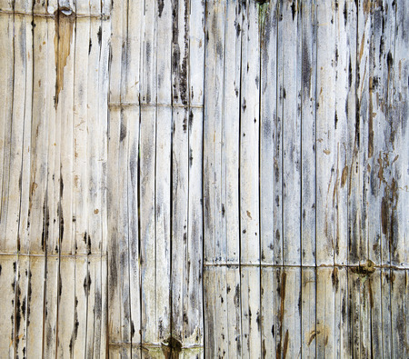 old bamboo is arranged as a backgroundの写真素材