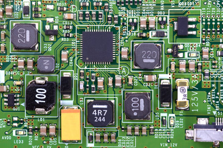 close-up of electronic circuit board with processor background