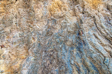 Soil under the foothills of the mountain, which was severely eroded.の写真素材