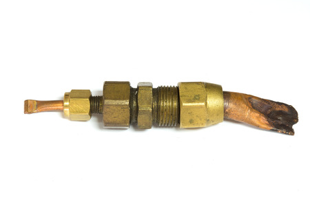 Bolts threaded copper pipe soldered connections for air conditioning isolate on whiteの写真素材