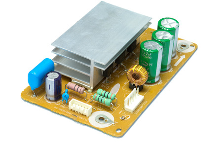 Integrated Circuit, inductor ferrite core in electronic circuit board isolate on whiteの写真素材