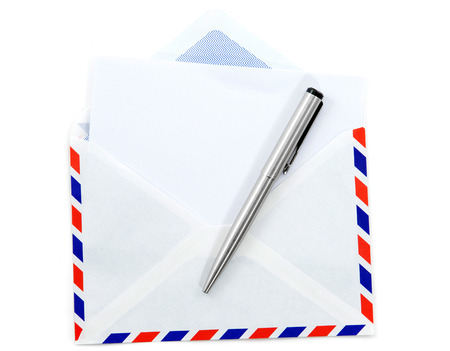 New air mail envelope and paper,pen on white backgroundの写真素材