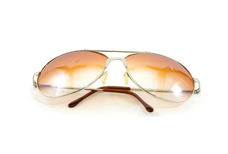 fashion men sepia sun glasses isolate on whiteの写真素材