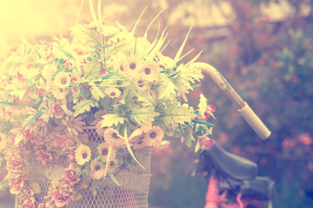 Detail of a Vintage Bicycle with Bouquet of flower, wedding decoration  (vintage color toned image)の写真素材