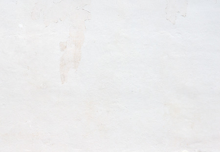 Grunge white concrete wall texture backgroundの写真素材