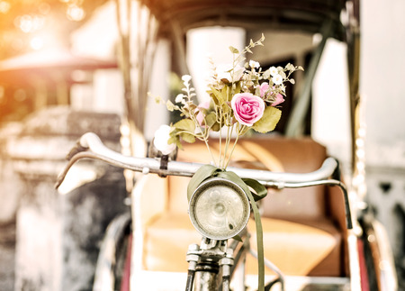 Old bicycle and flowers, vintage and retro styleの写真素材