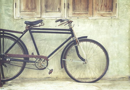 Vintage bicycle in coffee house, film look instagram effectの写真素材
