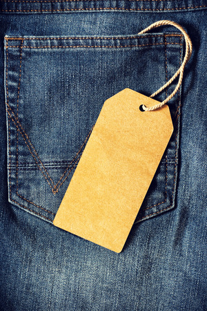 Empty brown paper tag of jeanの写真素材