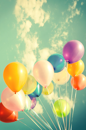 Colorful balloons of party in holiday - Vintage pastel toneの写真素材