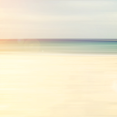 Blurred abstract background of beach with light bokeh - vintage color stylesの写真素材
