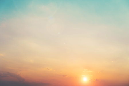 sunset on blue sky with clouds - vintage color effect styles