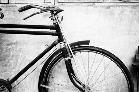Black and white photo of vintage bicycle - film grain filter effect stylesの写真素材