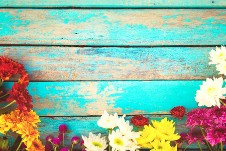 Colorful flowers bouquet on vintage wooden background, border design. vintage color tone - concept flower of spring or summer backgroundの販売画像