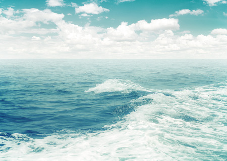 Vintage abstract nature background. surf of water foam from boat in ocean. vintage color effect tone.の写真素材