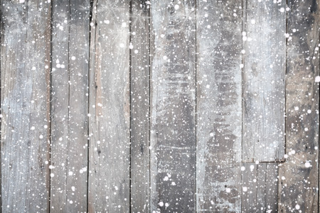 Christmas background - Old wood texture with snow. vintage and rustic styleの写真素材