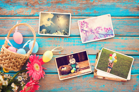 Photo album in remembrance and nostalgia of Happy easter day on wood table  backgroud. Holiday in spring season. vintage and retro style, top viewの写真素材