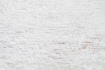 Christmas background - Old white wood texture with snow. top view. vintage and rustic styleの写真素材