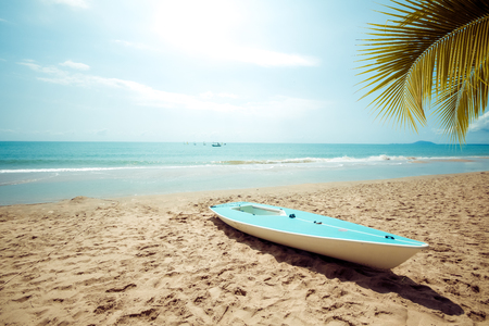 Sailboat on sand tropical beach in summer.の写真素材