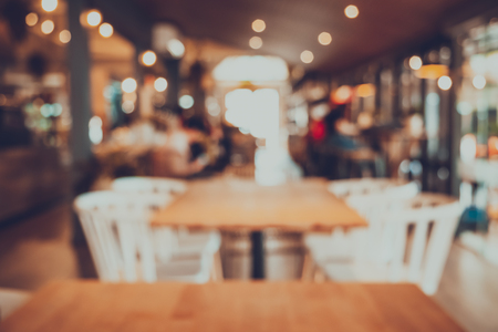 Coffee shop blur  with bokeh. retro filter effect.の写真素材