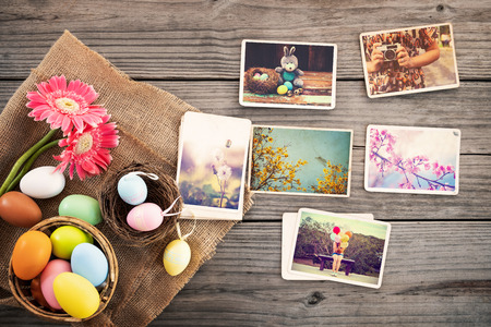 Photo album in remembrance and nostalgia of Happy easter day on wood table  backgroud. Holiday in spring season. vintage and retro style, top viewの写真素材